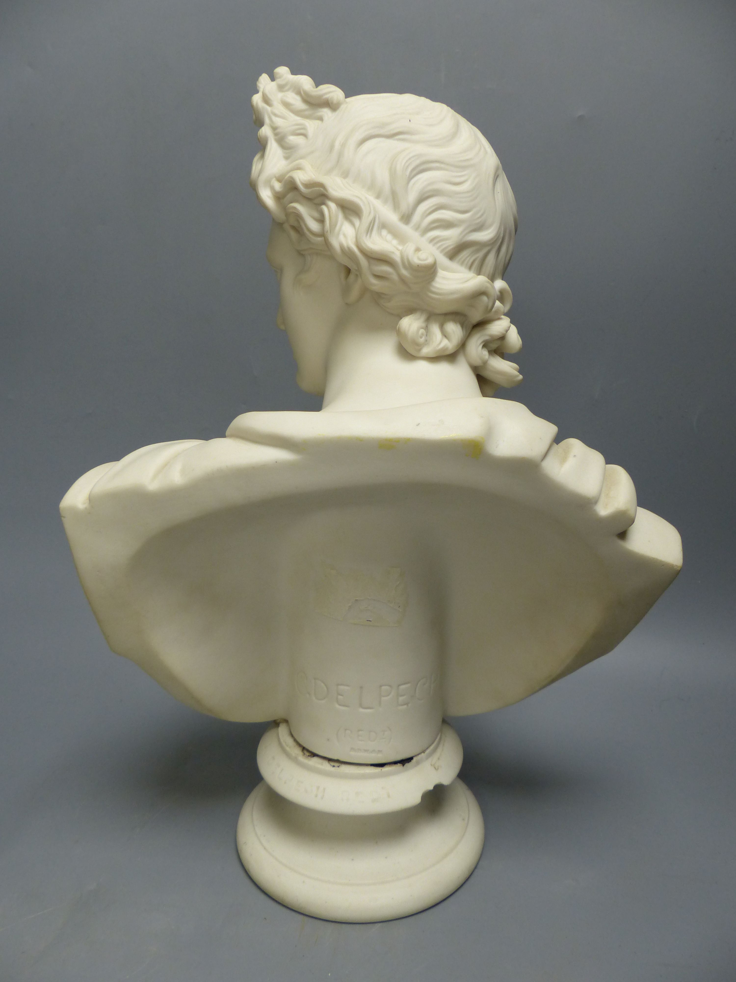 A Brown Westhead and Moore parian bust of Apollo, height 36cm, together with a plaster wall bracket